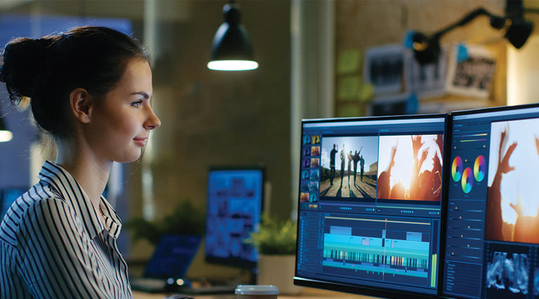 Student using video production software