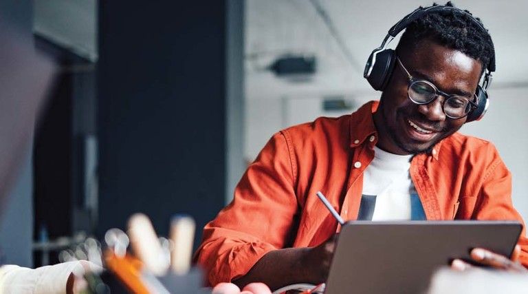 A man uses a laptop