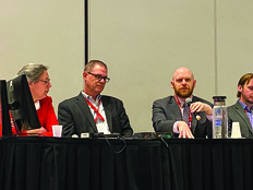 A panel presents at EDUCAUSE