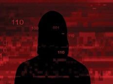 Shrouded image of a hacker