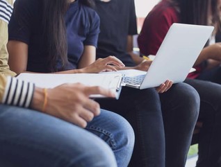 An image of students at work on their devices