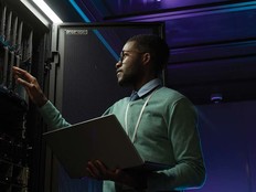 Black man working on a data center