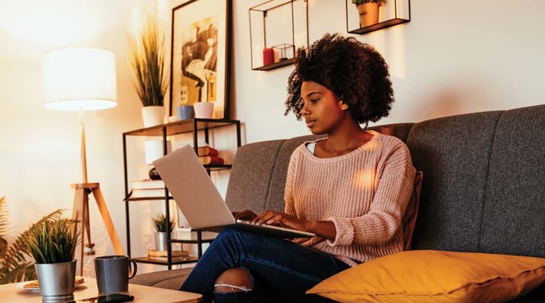 Black college student studying online