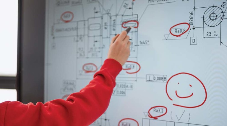 A student uses an interactive display