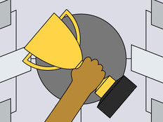 An illustration of a hand hoisting a trophy