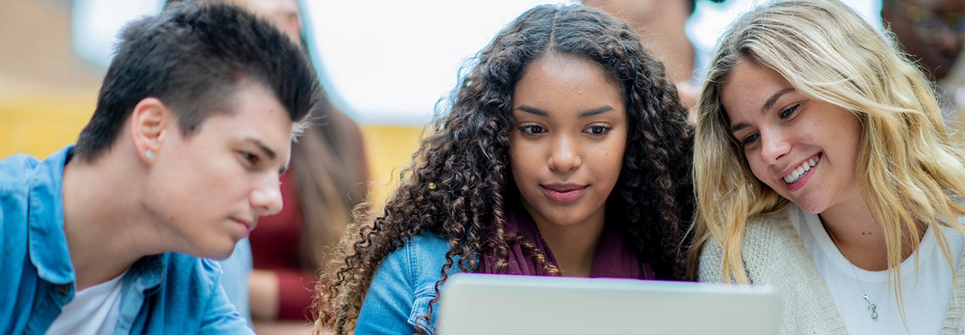 Community college students on computer