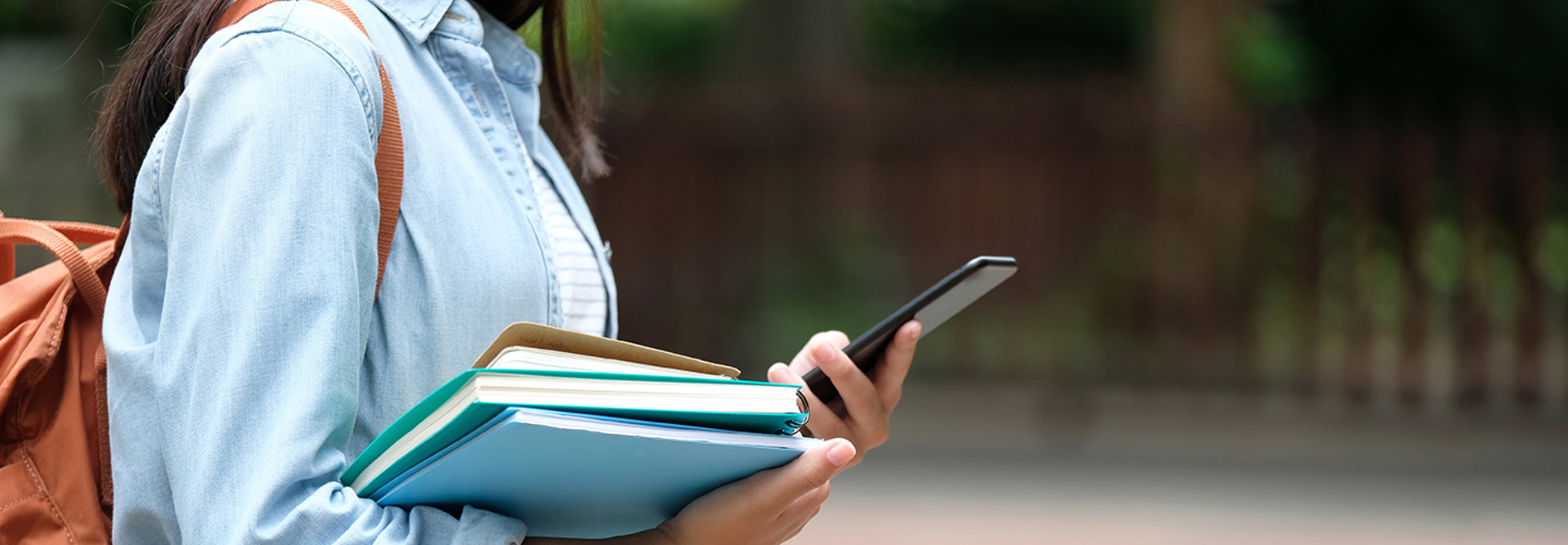 College kid with phone