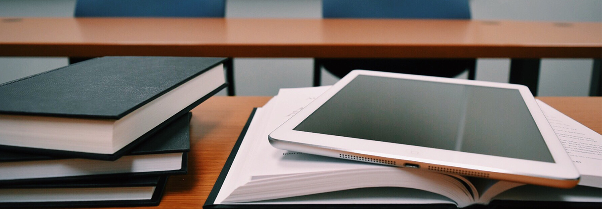 iPad on top of book