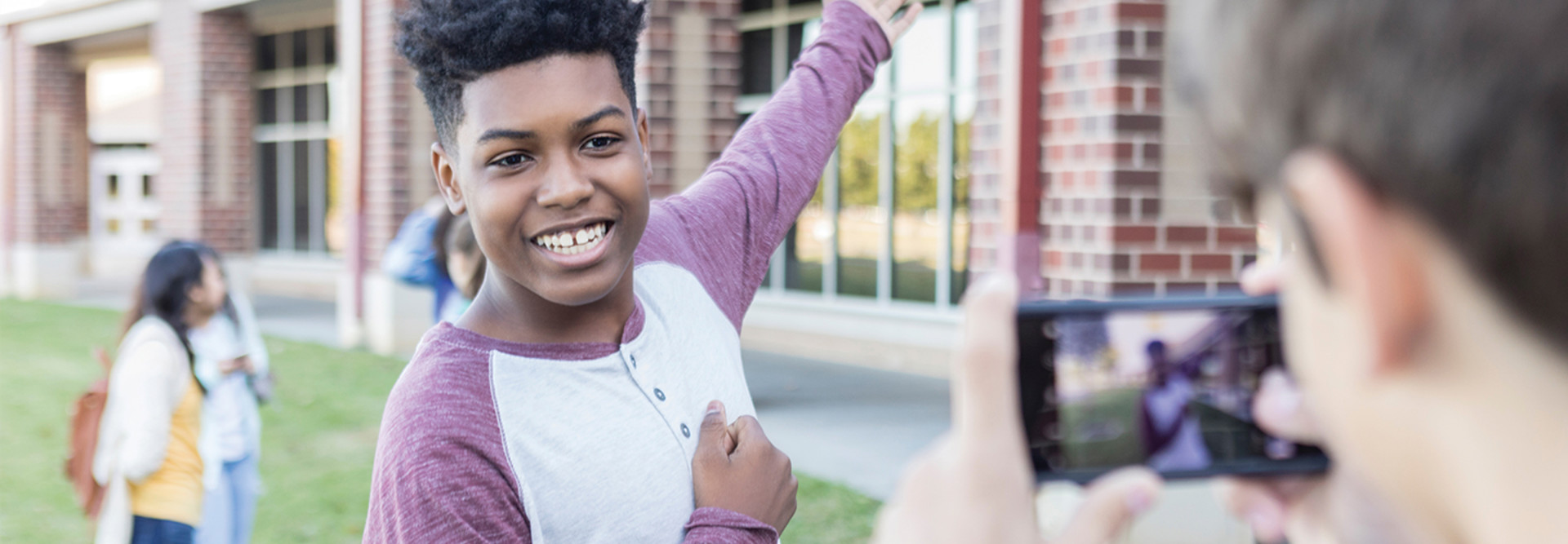 Smiling student gives campus tour