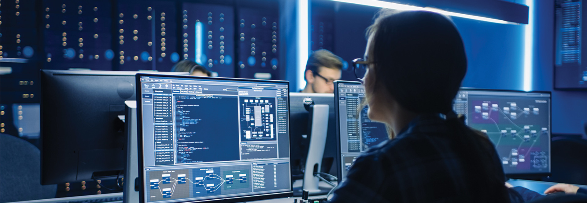 Woman at security monitors