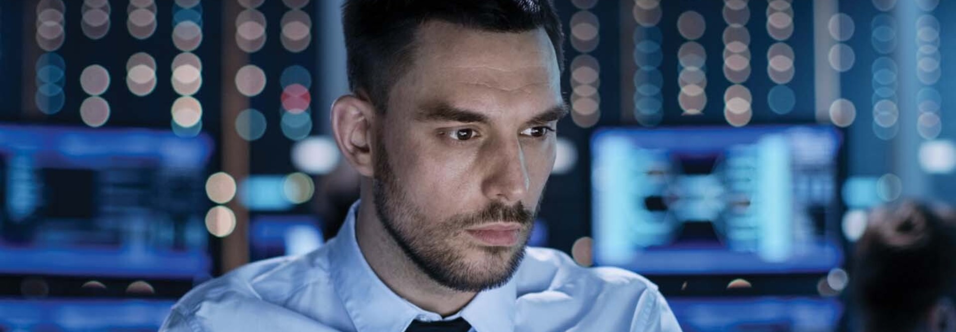 A man works at a workstation