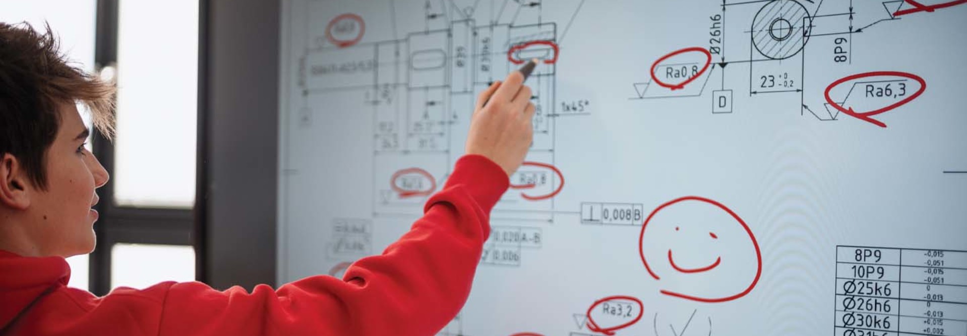 A student uses an interactive display