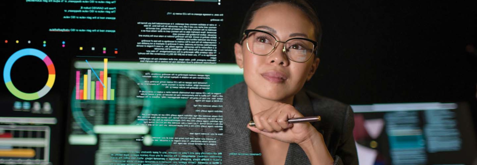 A woman looks at a transparent display