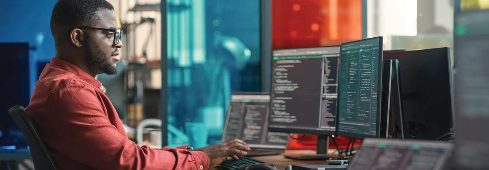 Person programming in office