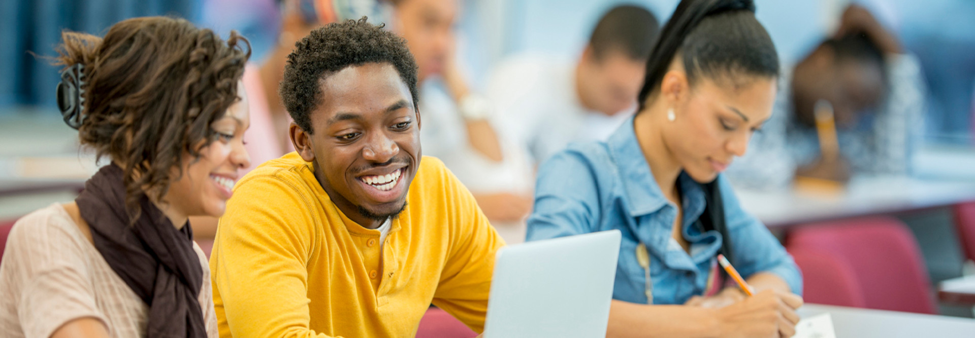 College students working together in class