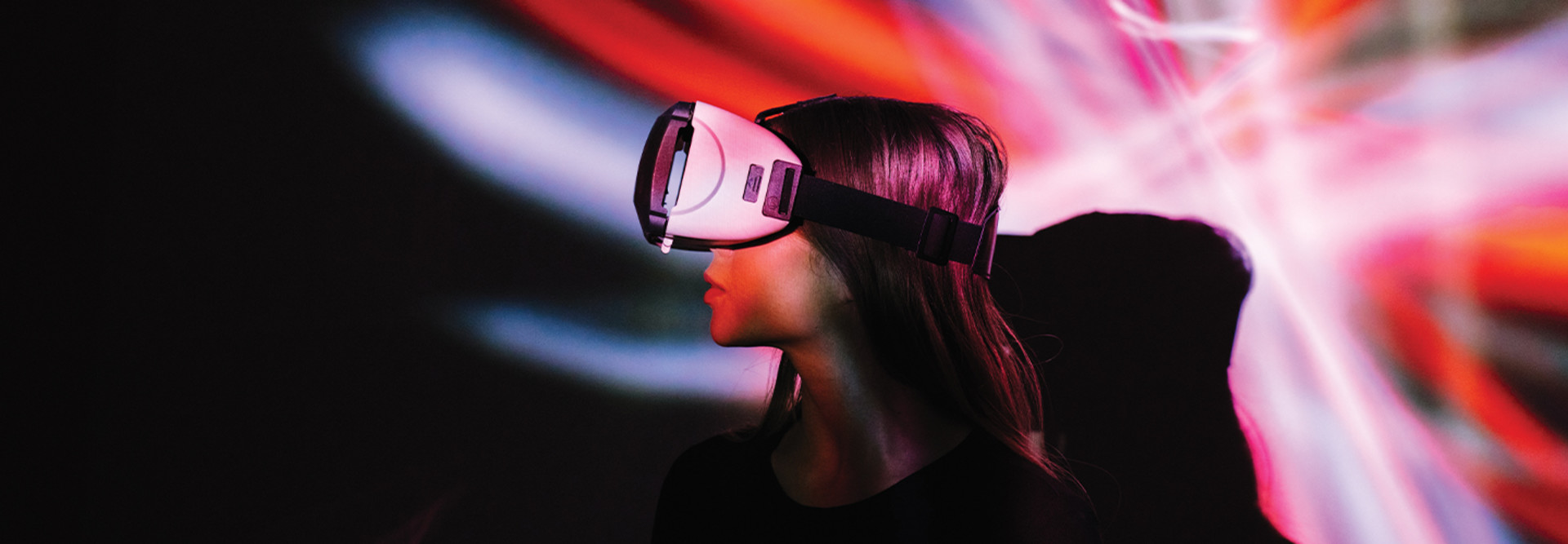 Side view of a person wearing a VR headset