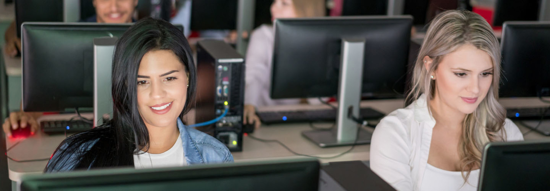 Students using computers in a classroom