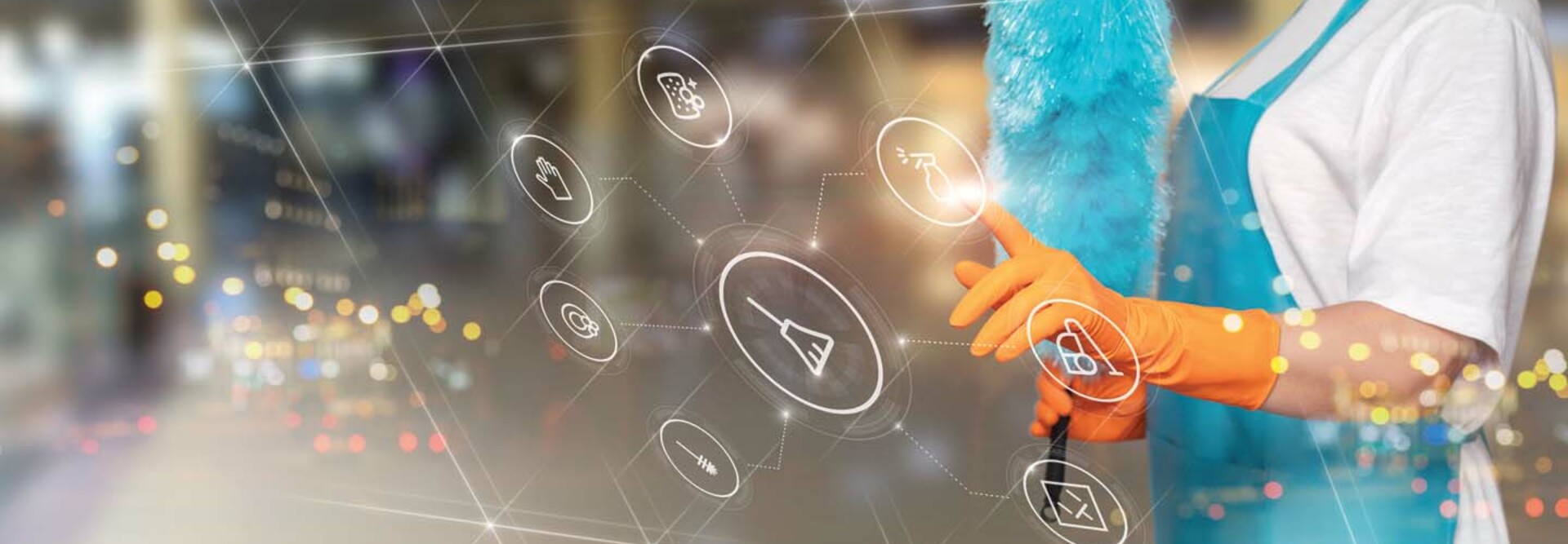 A woman holding a feather duster is superimposed behind a tranparent touch screen display