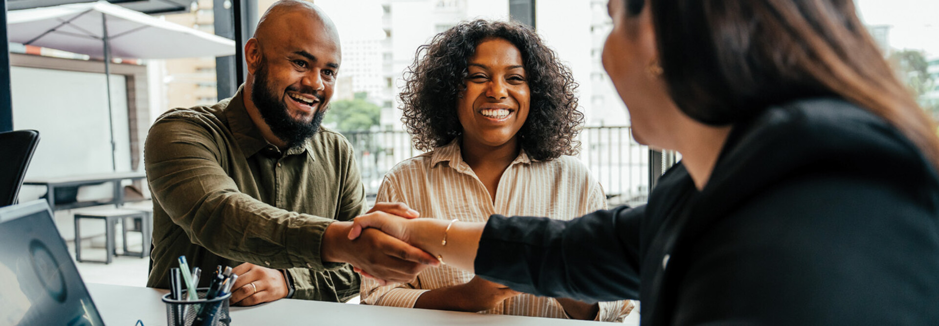 People meeting and shaking hands