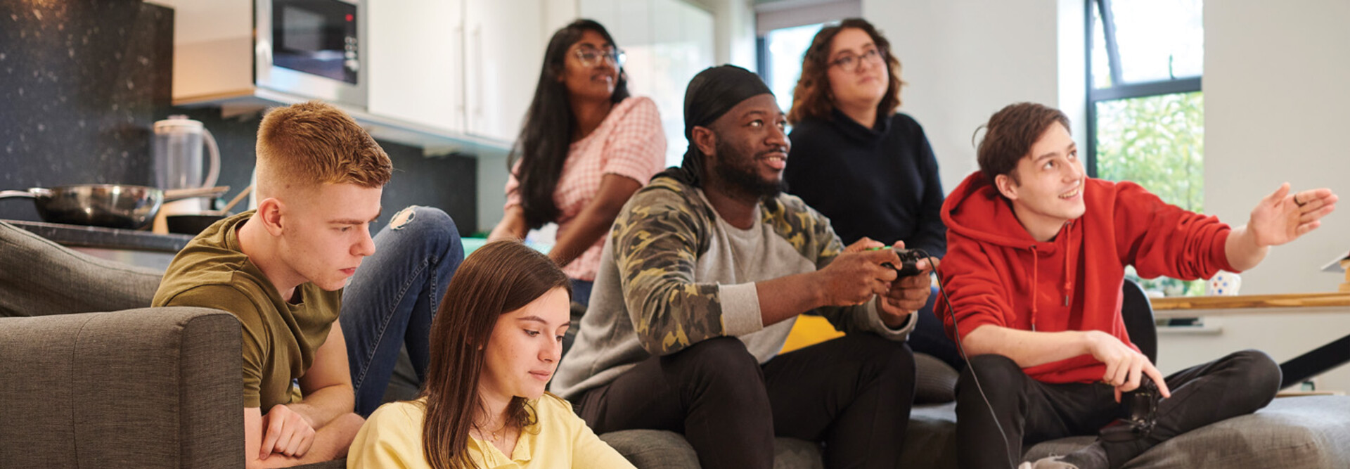 Students in a dorm room 