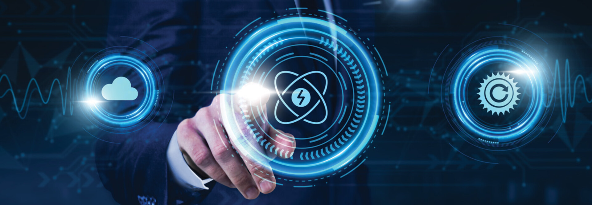 Person pressing illustrated atom