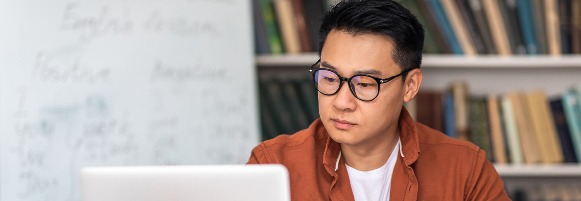 Student taking notes