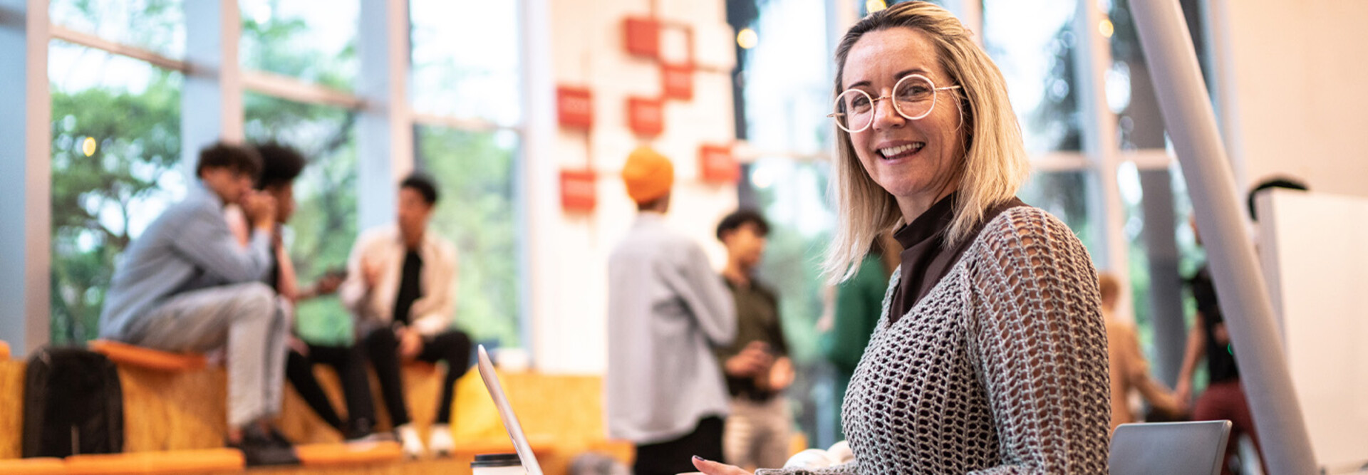Person working on computer on campus