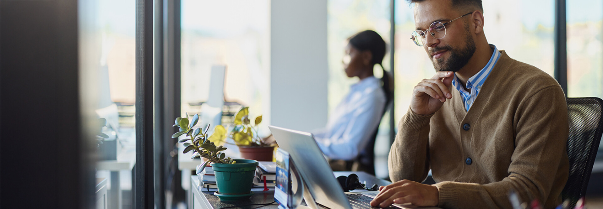 Man working on a computer in an office
