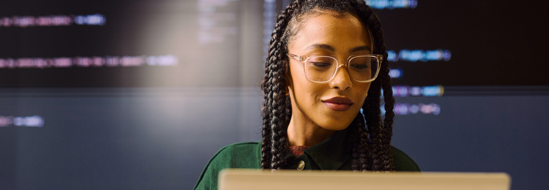 Person coding on computer