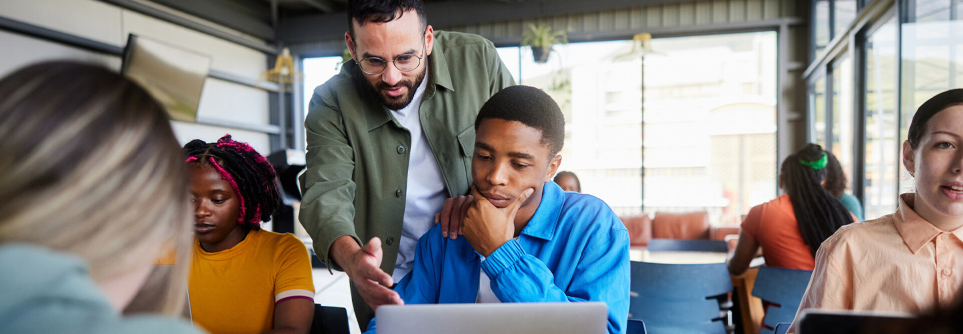 Professor helping students