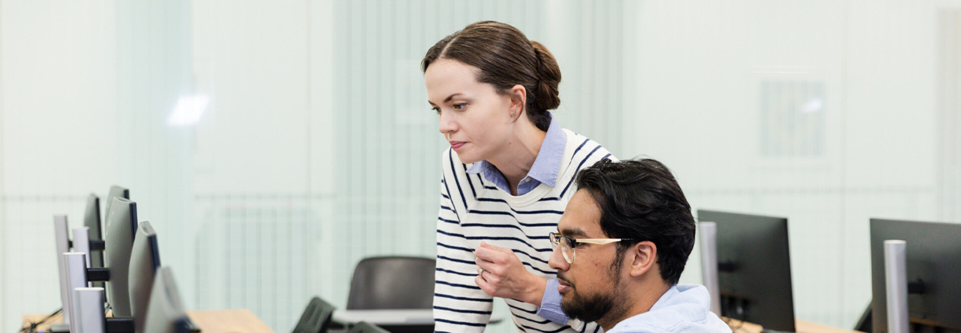 IT team looking at computer