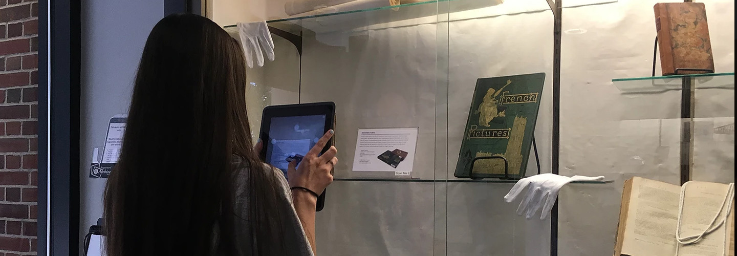 washcoll girl uses AR to study an artifact