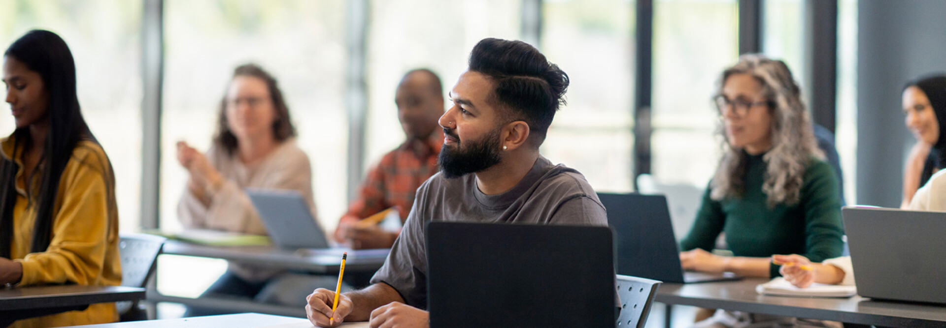 Person listening to lecture in classroom