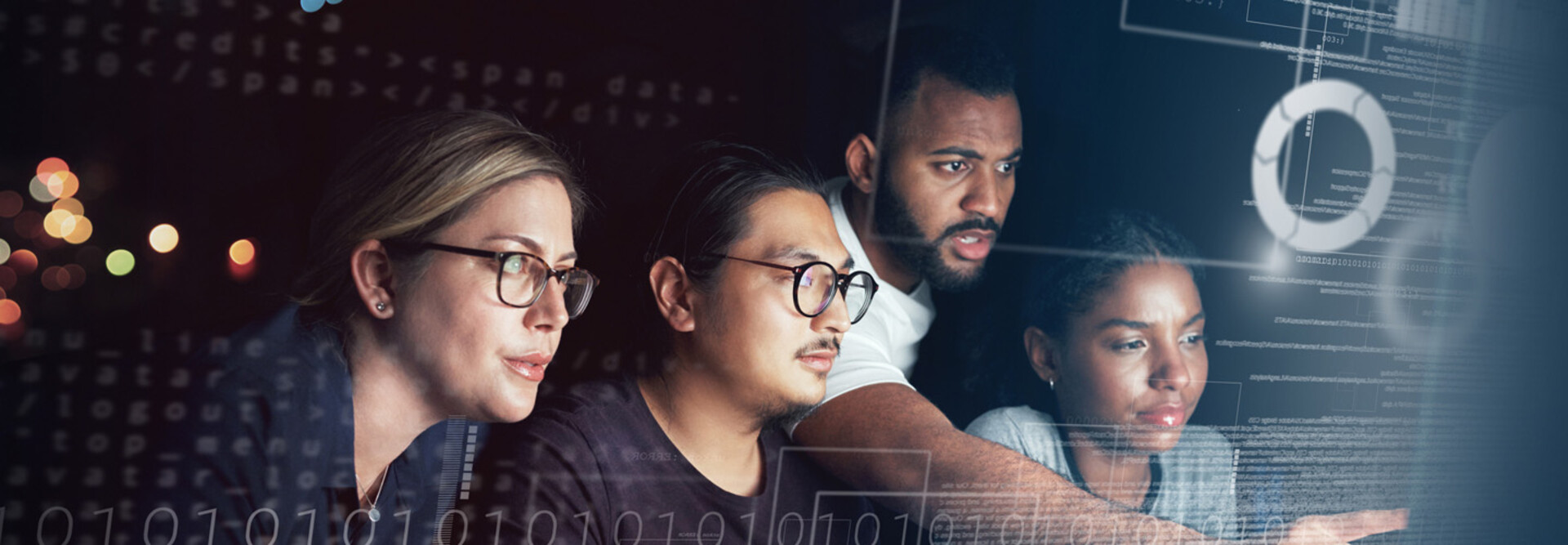 People working on computer together 