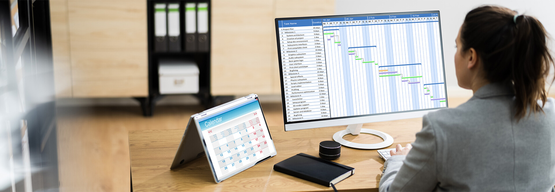 woman doing project management at a computer