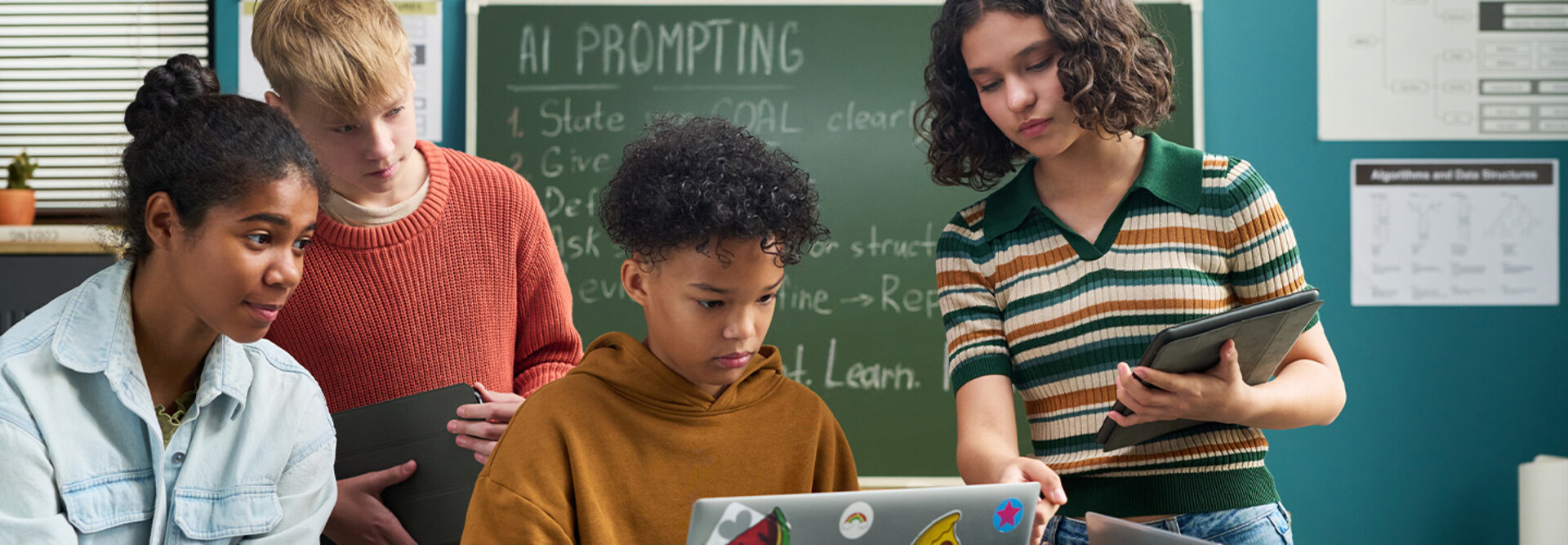 Students using computer in class
