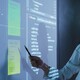 Person reviewing data in meeting