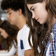 College students studying on laptops