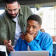 Professor helping students