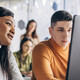 Students looking at computer