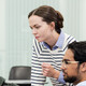 IT team looking at computer