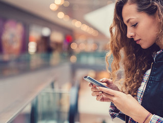 student on cell phone