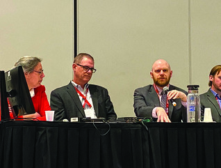 A panel presents at EDUCAUSE