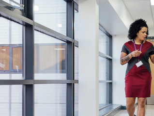 University staff walking through university