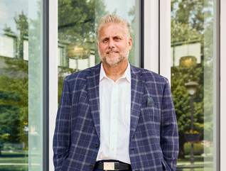 Posed photograph of Ray Stanley on the Marian University campus