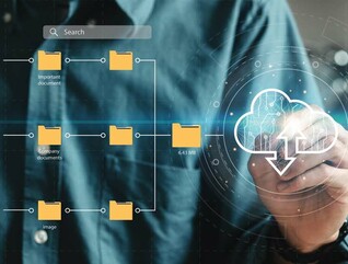 Visualization of a man using a touchscreen to move files into the cloud