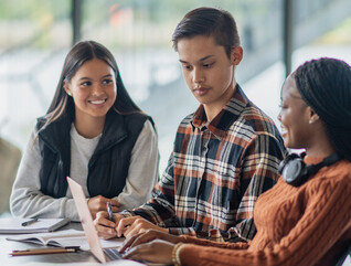 Students collaborating in class