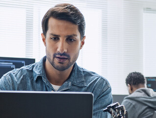 Person using computer in the office