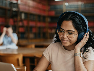 Student working in a library