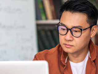 Student taking notes